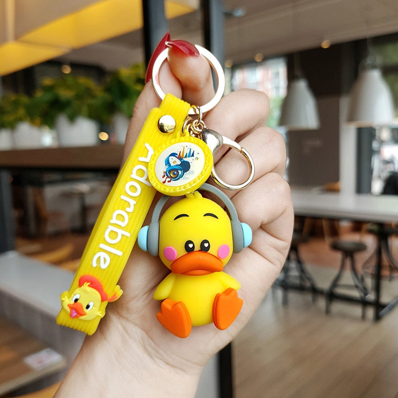 Qfdian Party gifts hot sale new New Cute Music Duck Keychain Cartoon Silicone Duck Keyring Fashion Car Accessories Creative Bag Ornaments